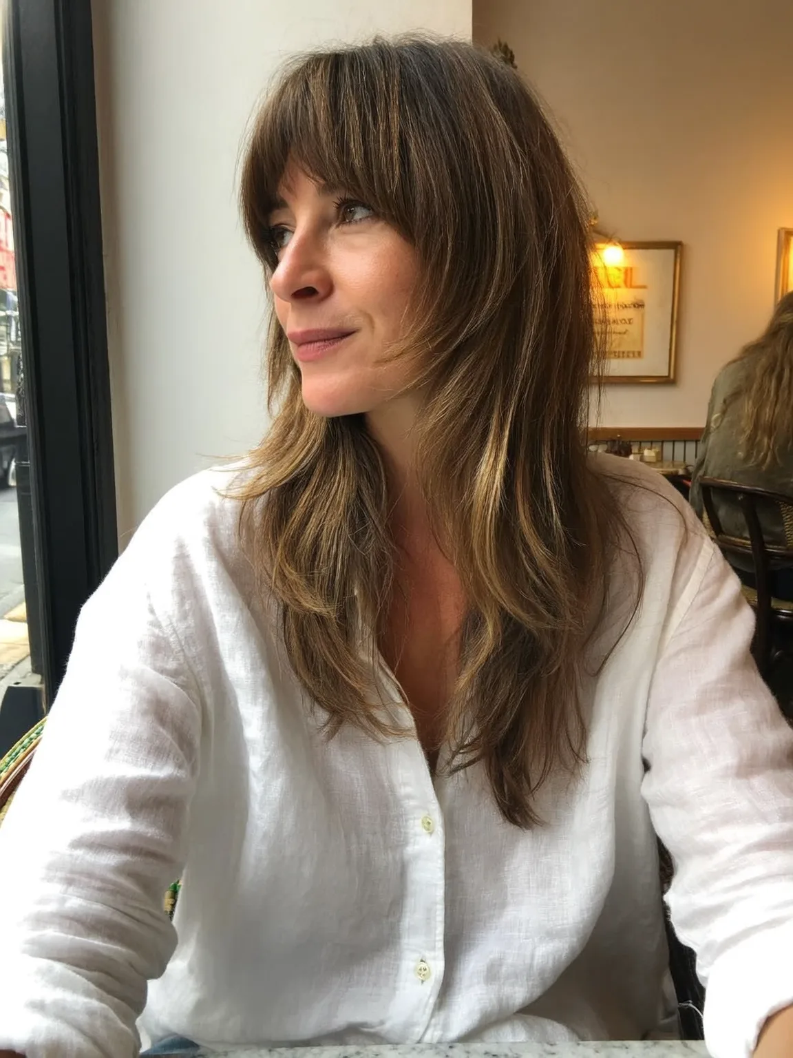 Long Layered Waves with Chestnut Curtain Bangs